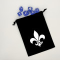 Flat black dice purse with white fleur-de-lis motif 0